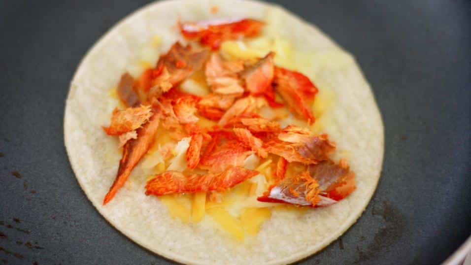 adding smoked salmon