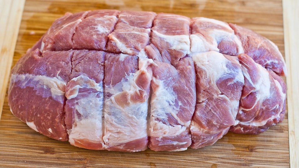 a piece of pork shoulder with bone in
