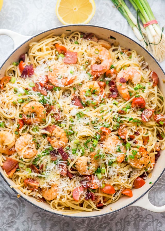 Overhead of pot full of shrimp and bacon scampi