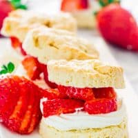 strawberry shortcakes lined up on a plate