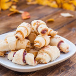 a plate full of white chocolate and apricot rugelach