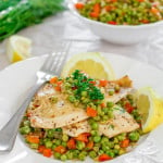 fresh sole with pea salad on a plate