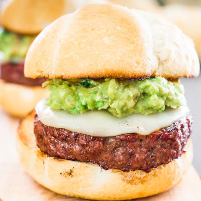 Burgers with Guacamole aka "The Beast" - a huge burger with guacamole and cheese on a toasted bun. 