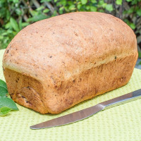 a loaf of olive cheddar bread
