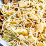 sesame cabbage salad in a large shallow white plate