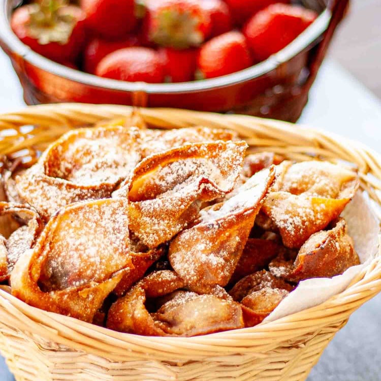 strawberry nutella wontons in a basket.
