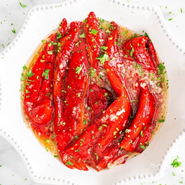 overhead shot of a bowl full of roasted red peppers