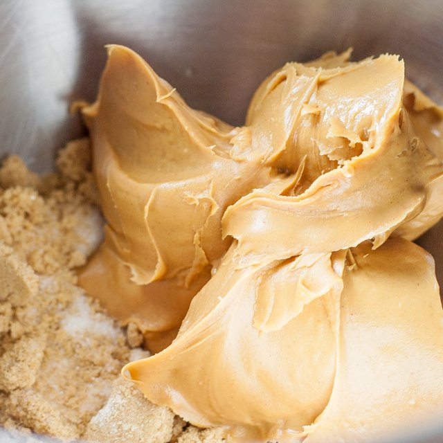 Peanut butter, brown and white sugar in a bowl