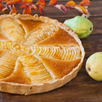 a freshly baked pear and almond tart