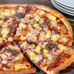 a gorgeous fresh out of the oven hawaiian pizza.