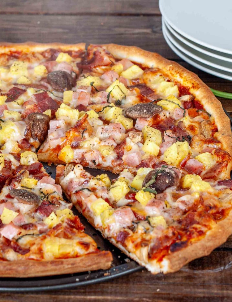 a gorgeous fresh out of the oven hawaiian pizza.