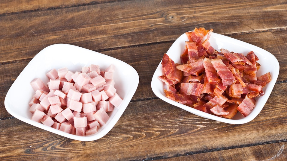 A bowl of bacon and chopped ham