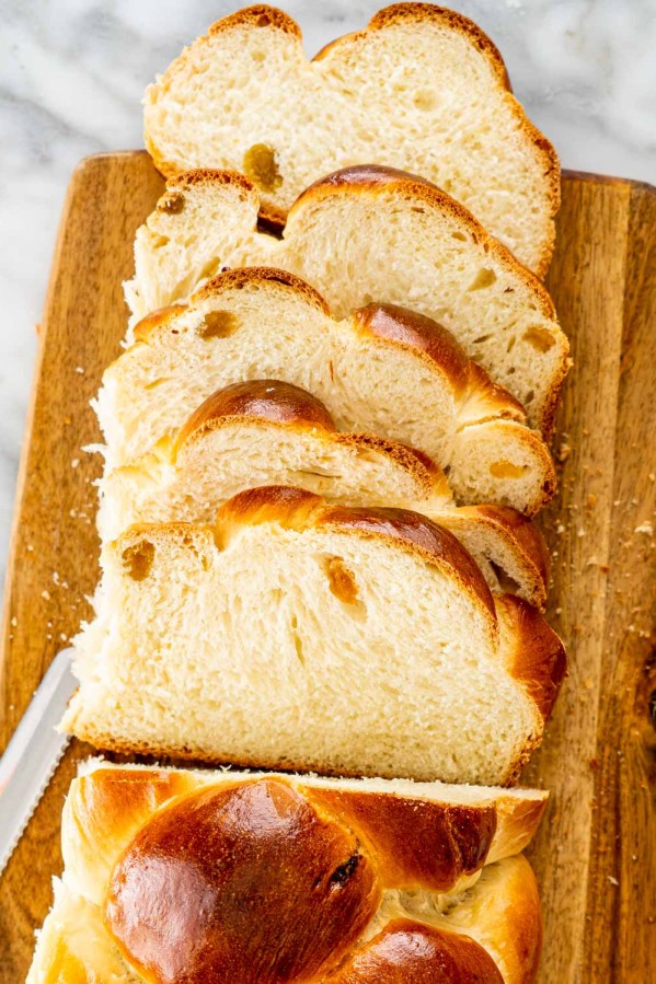 overhead shot of sliced raisin bread on a cutting board