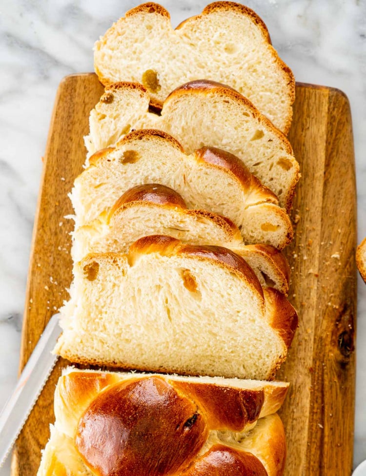 overhead shot of sliced raisin bread on a cutting board