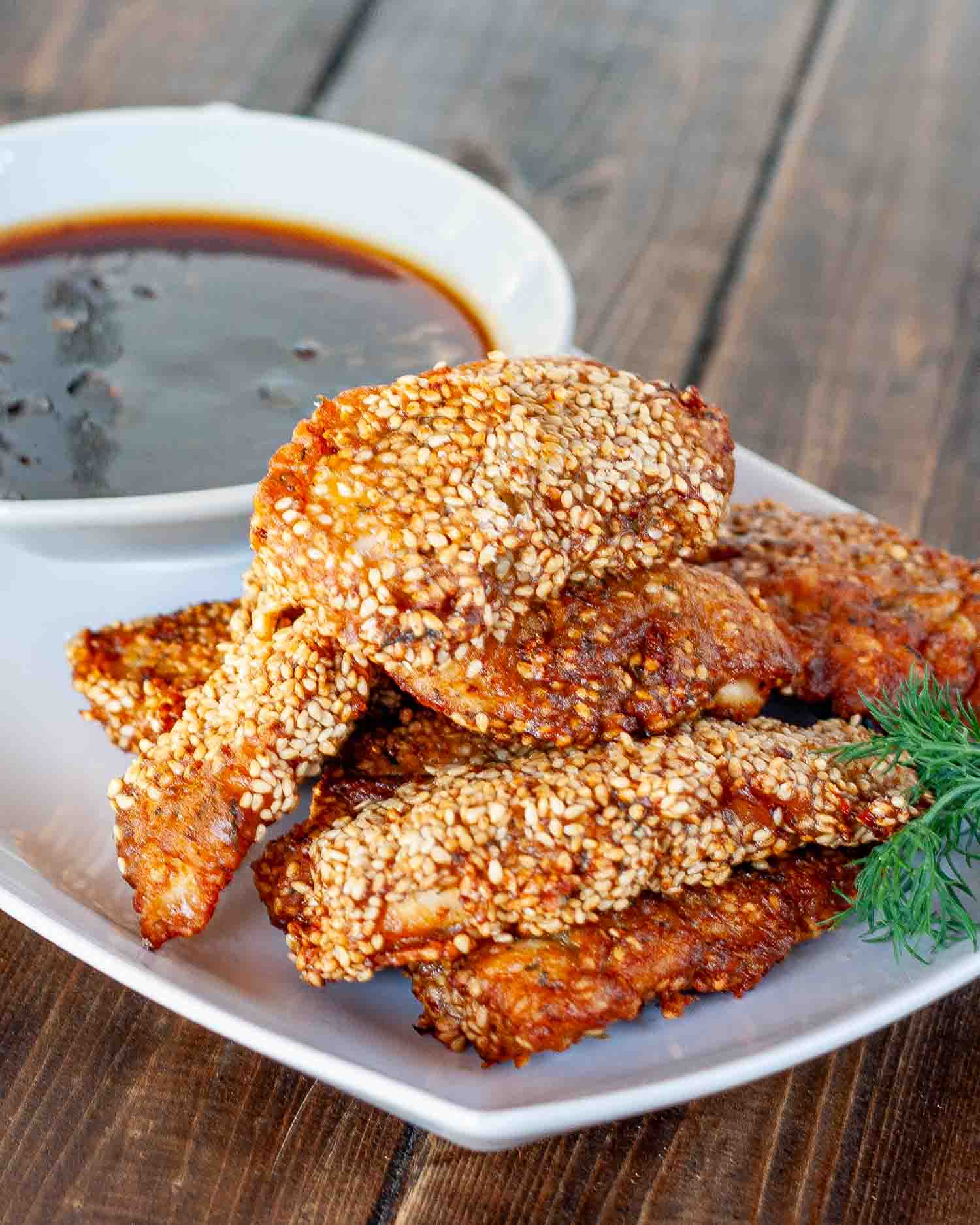 process shots showing how to make sesame crusted chicken.