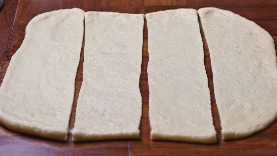 Dough is cut into 4 strips