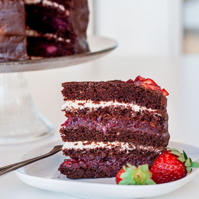 A slice of Chocolate Cake with Mixed Berry and Cream Cheese Filling