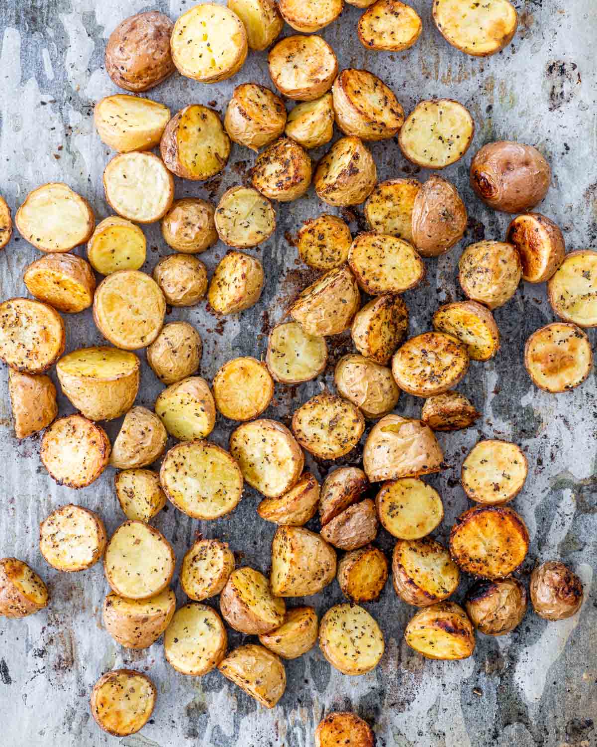 roasted baby potatoes on a baking sheet.