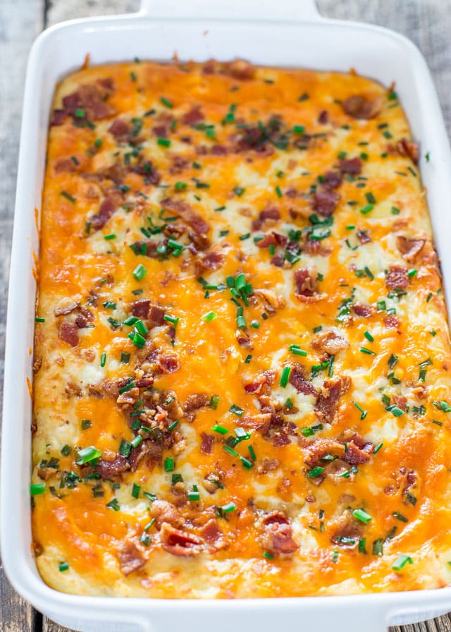 cheesy mashed potatoes right out of the oven in a casserole dish