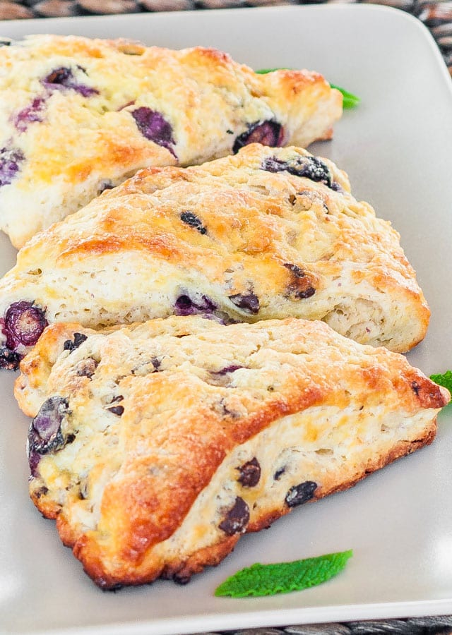 3 blueberry chocolate chip scones on a platter