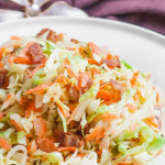 a bowl of cabbage bacon salad with buttermilk vinaigrette