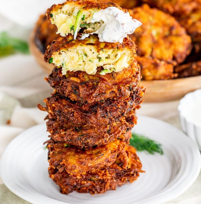 a stack of potato zucchini fritters on a plate
