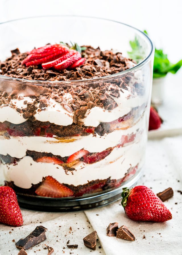 layers of mascarpone, chocolate, and strawberries in a trifle bowl