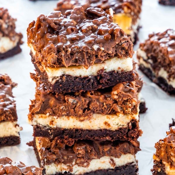 3 triple layer brownies stacked on top of one another