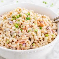side view shot of a bowl full of macaroni salad