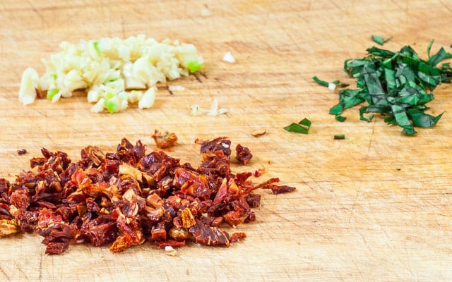 chopped sun-dried tomatoes, basil, garlic for jalapeno poppers