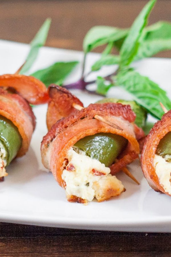 screaming stuffed jalapeno poppers wrapped in bacon