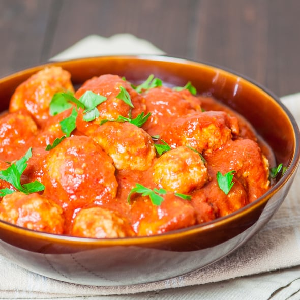 Healthy turkey meatballs with marinara sauce in a bowl
