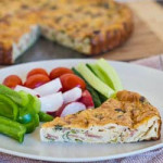 a slice of leek and turkey bacon quiche