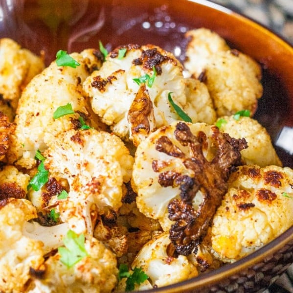 a bowl full of cauliflower poppers