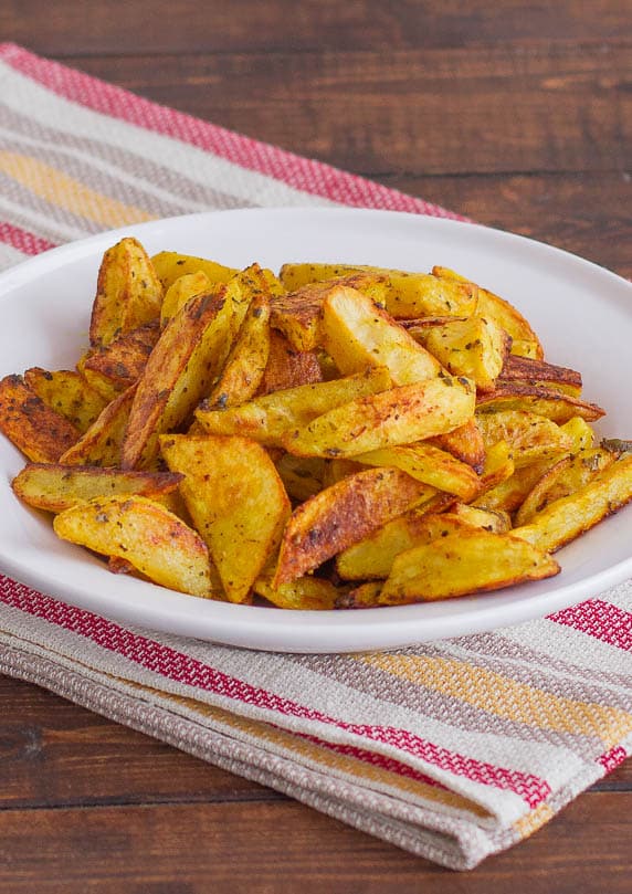 Crispy Indian Spiced Potato Wedges on a plate