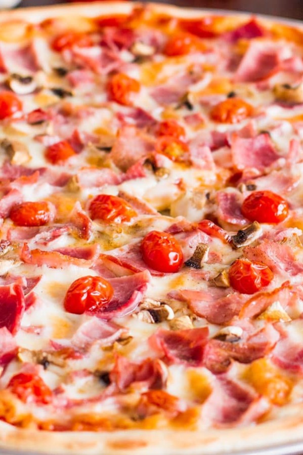 close up shot of a deli pizza