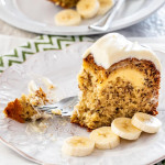 side view shot of a slice of banana cake with a bite missing