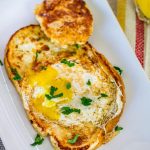 overhead shot of a french toasted egg in a hole on a plate