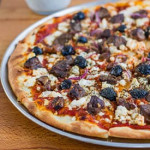 sliced lamb souvlaki pizza