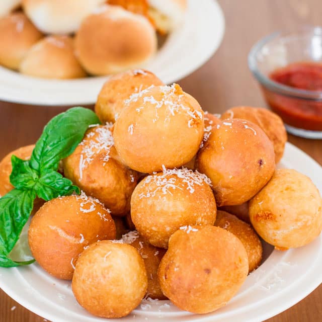 Pizza balls stacked on a plate