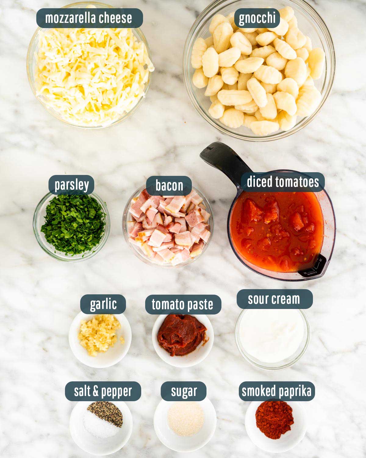 overhead shot of all the ingredients needed to make cheesy gnocchi bake