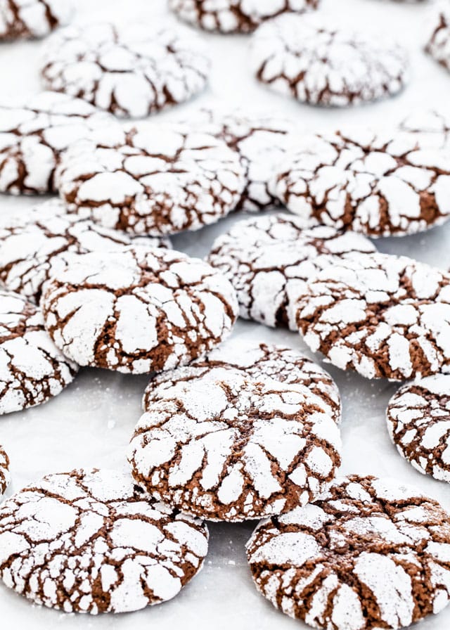 Chocolate Crinkle Cookies on parchment paper