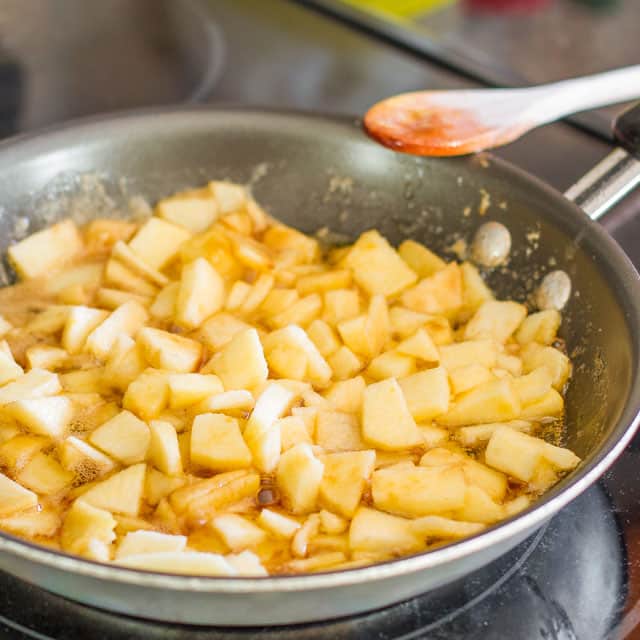 apples with caramelized butter and brown sugar in a pan