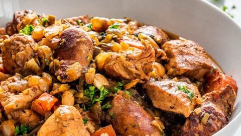 side view of a bowl full of french cassoulet