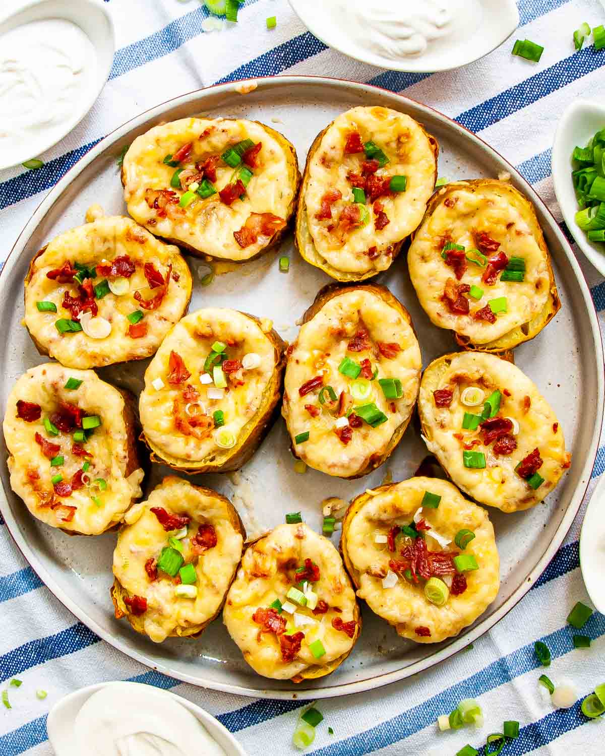 overhead shot of twice baked potato slices on a serving platter.