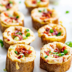 closeup of twice baked potato slices on a serving platter.
