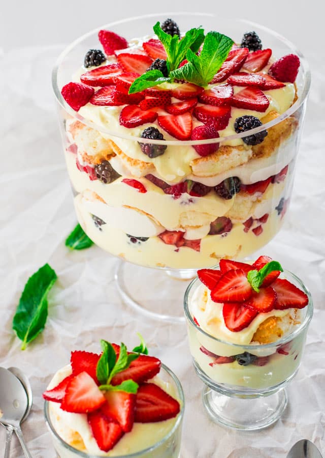 Angel Berry Trifle in a trifle bowl and two small bowls of angel berry trifle