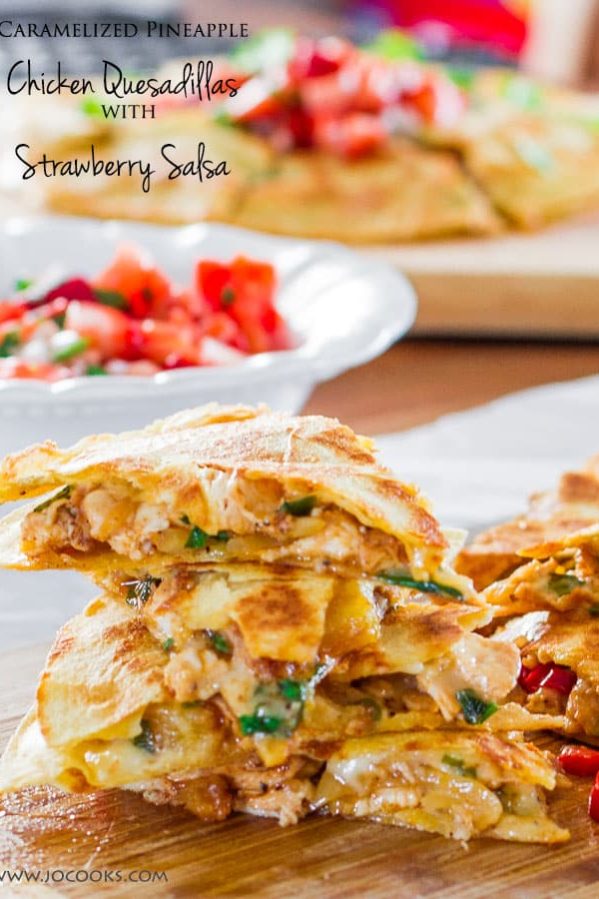 caramelized pineapple chicken quesadillas on a cutting board