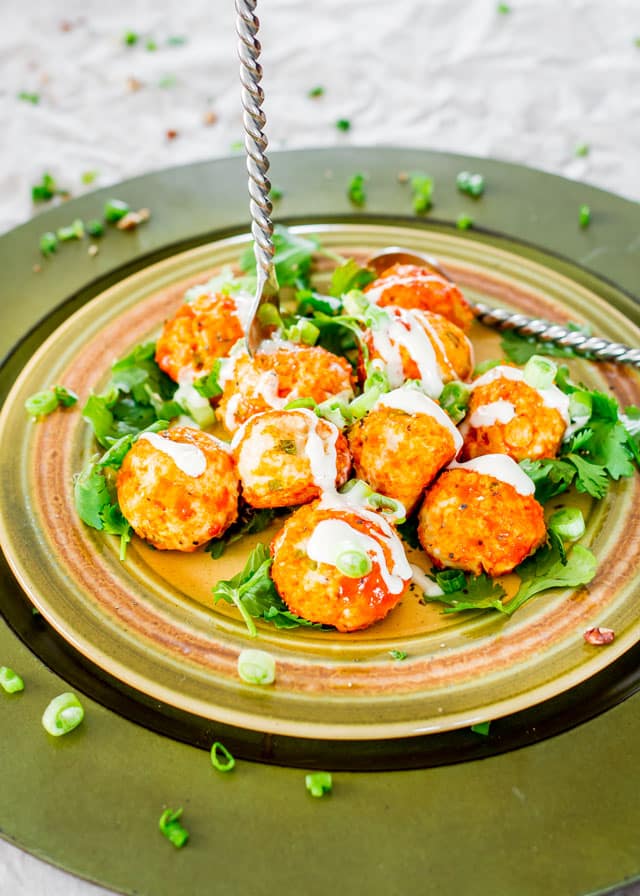 Crockpot Buffalo Chicken Meatballs with Blue Cheese Dressing on a plate