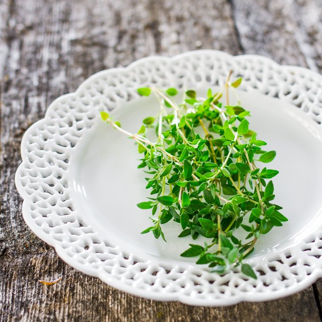 Thyme sprigs on a plate
